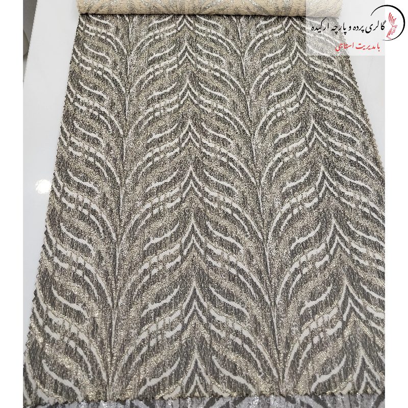 پارچه ژاکارد سیم‌ دوزی شده با طرح‌های برجسته و جزئیات ظریف، مناسب برای پرده‌های لوکس