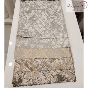 پارچه ژاکارد سیم‌ دوزی شده طرح پتینه با طراحی برجسته و جلوه‌ای خاص
