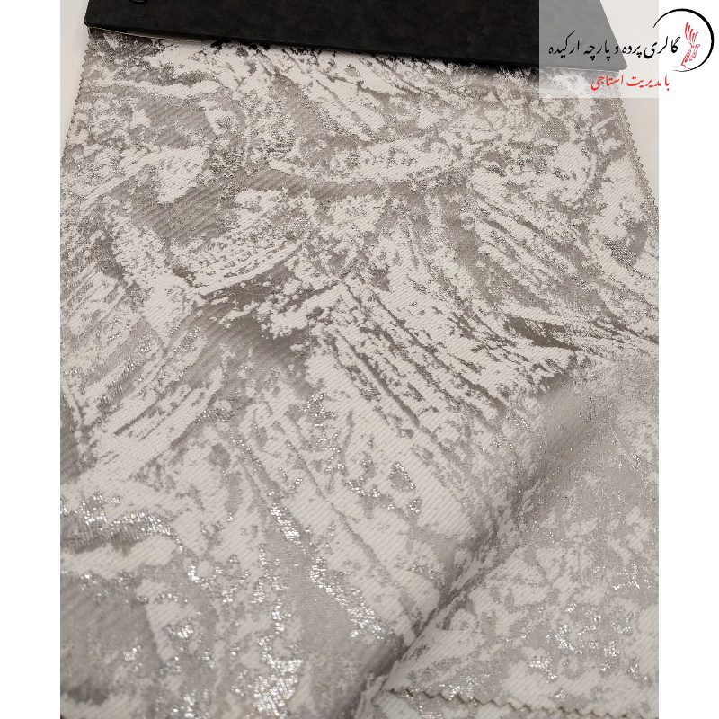 پارچه ژاکارد سیم‌ دوزی شده طرح پتینه با طراحی برجسته و جلوه‌ای خاص